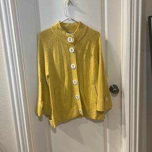 The softest yellow cardigan you’ll ever feel by Chloe Dao. Specialty buttons.